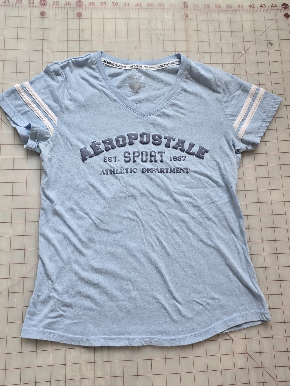 Aeropostale Light Blue V-Neck Sport Tee with White Sleeve Stripes